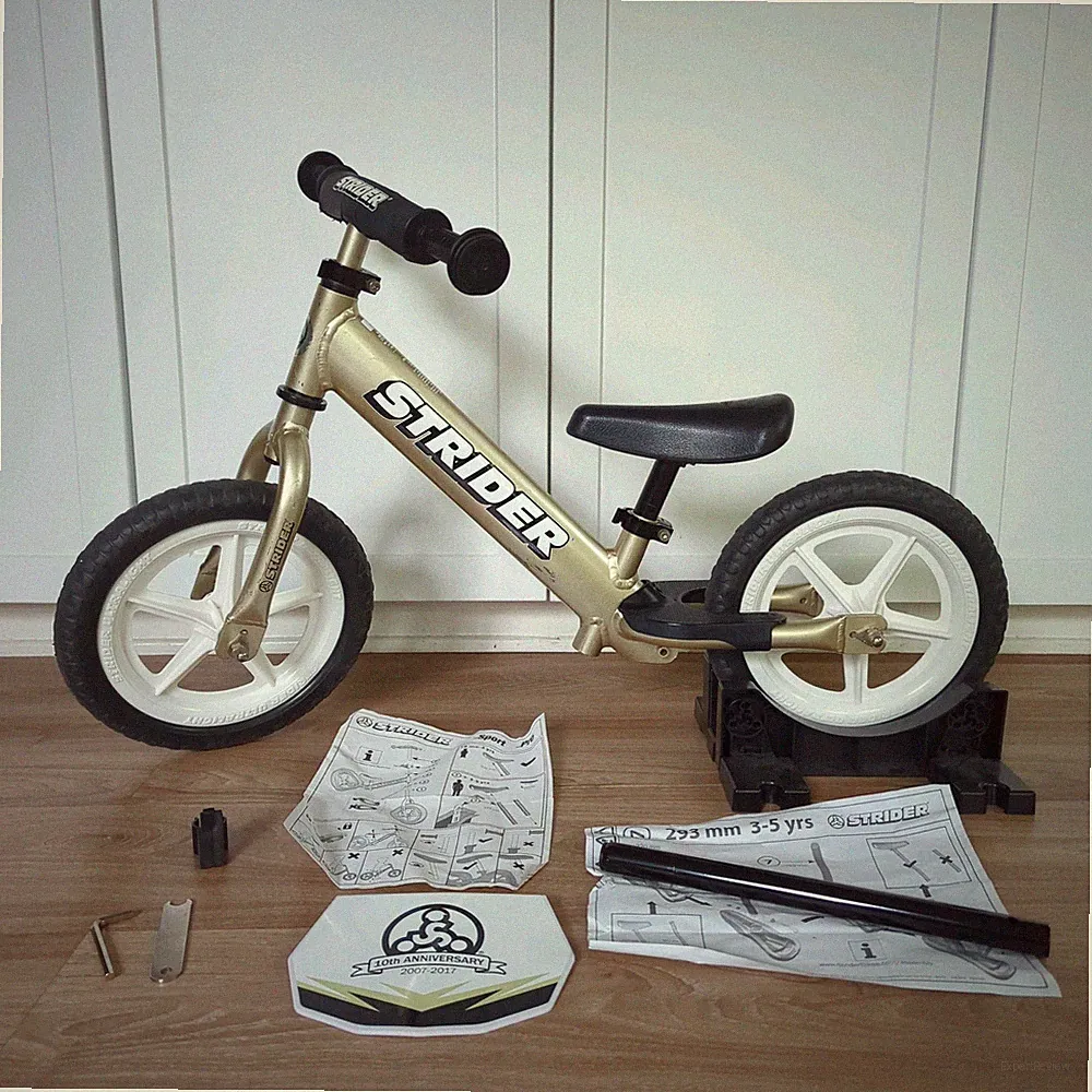 LIMITED EDITION - Strider Pro Balance Bike 10th Anniversary Champagne Gold
