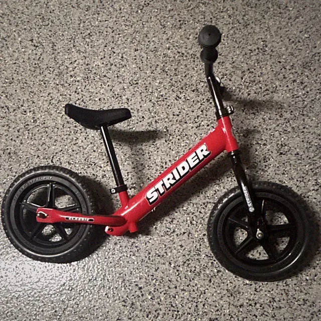 Strider 12 Classic Balance Bike Red Adjustable Seat Solid Rubber Tires Steel